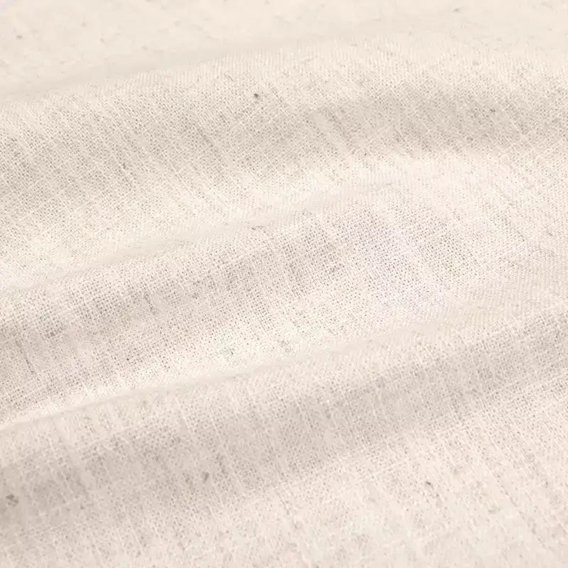 Cabecero tapizado de lino con borde festoneado – Curvado, con botones capitoné, detalles de tachuelas